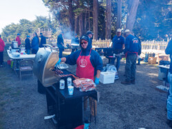 Volunteers grilling